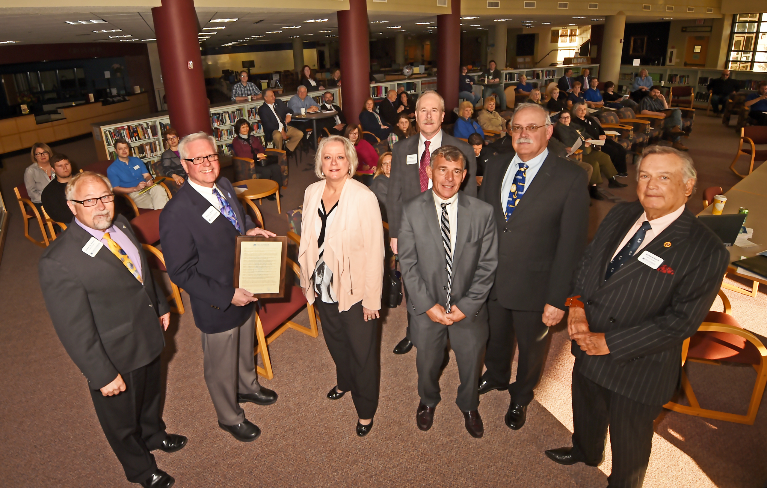 LSSU President Mitchell receives resolution from LSSU Board of Trustees