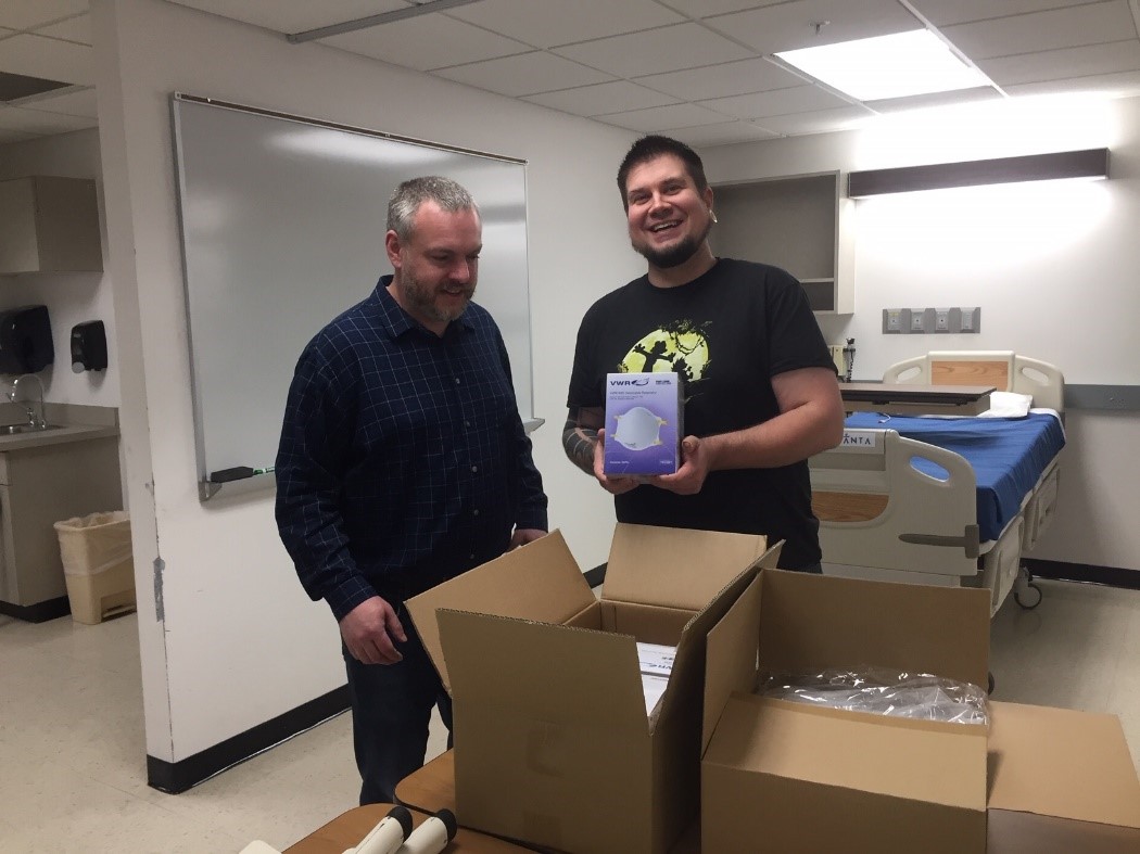 faculty packing up N95 masks